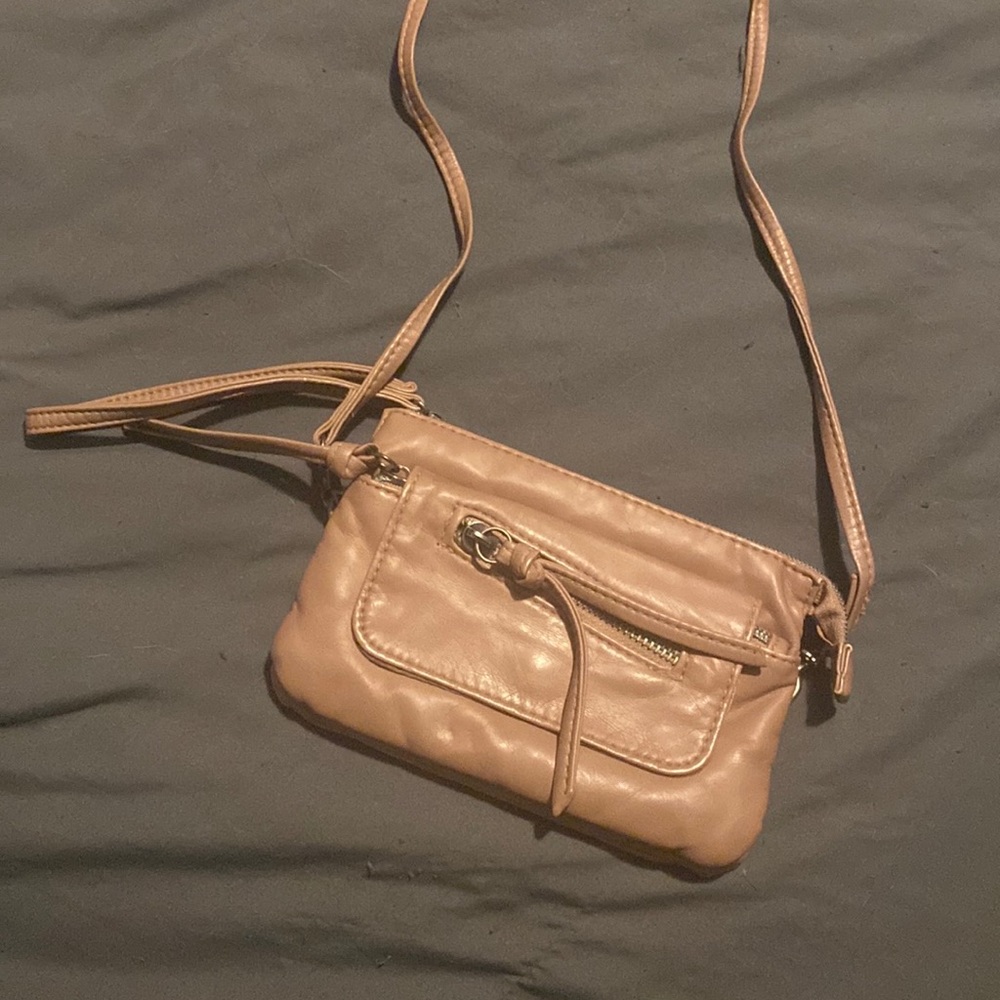 Small blush colored crossbody 3x5 inches. Super small.